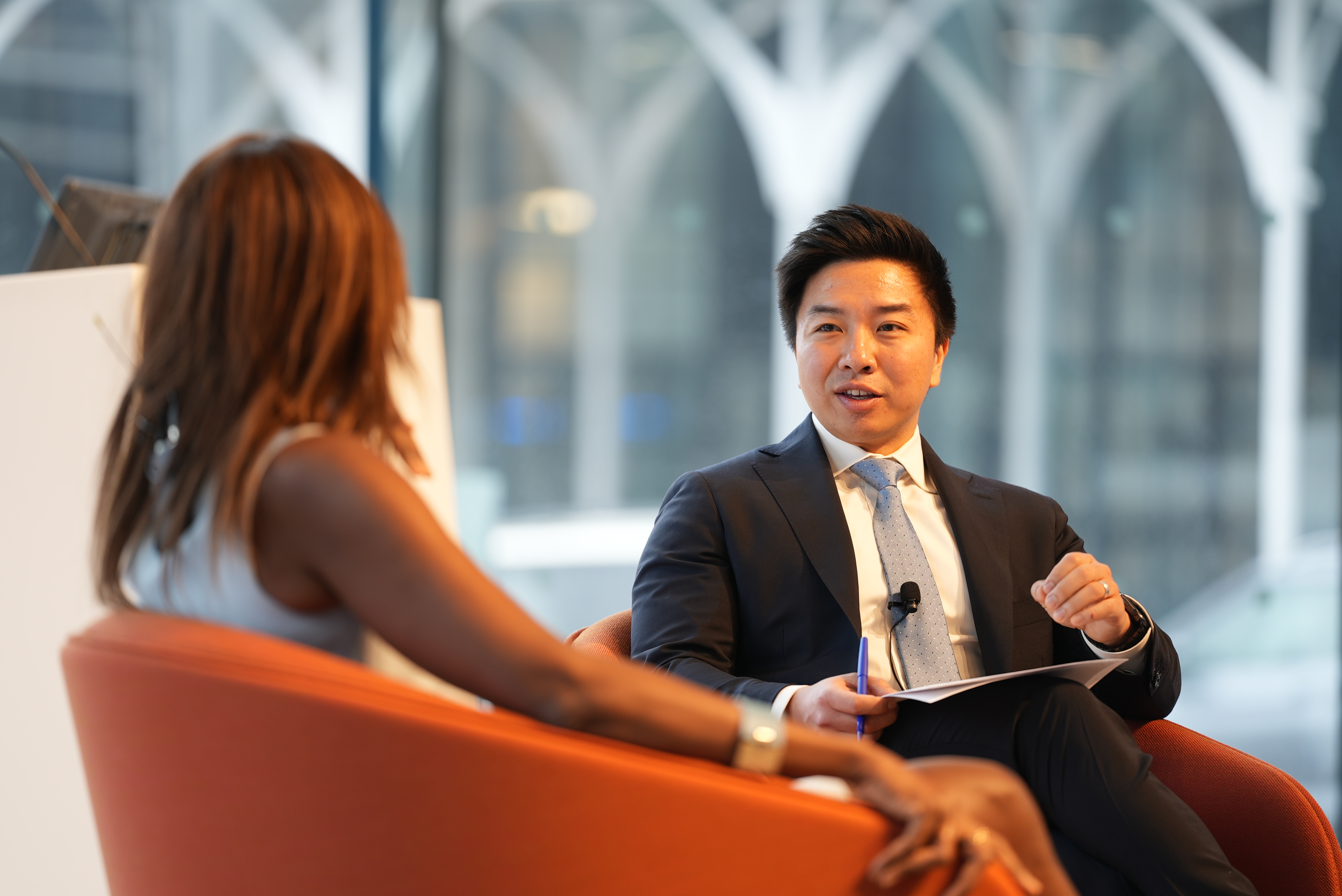 Dan Wang, associate professor of business, with Asahi Pompey (’97 LAW), global head of corporate engagement for Goldman Sachs, Cooperman Commons, Geffen Hall.
