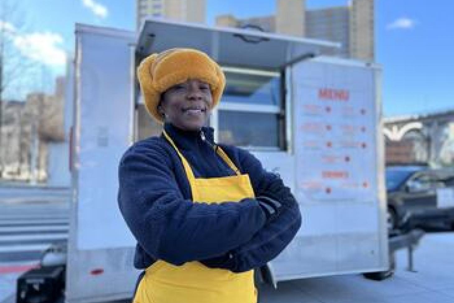 Harlem Local Vendor Program participant Dawn Demry, owner of the Little Hot Dog Wagon, sells her fare everywhere from a food truck outside the Business School to local restaurants and Key Food supermarkets.