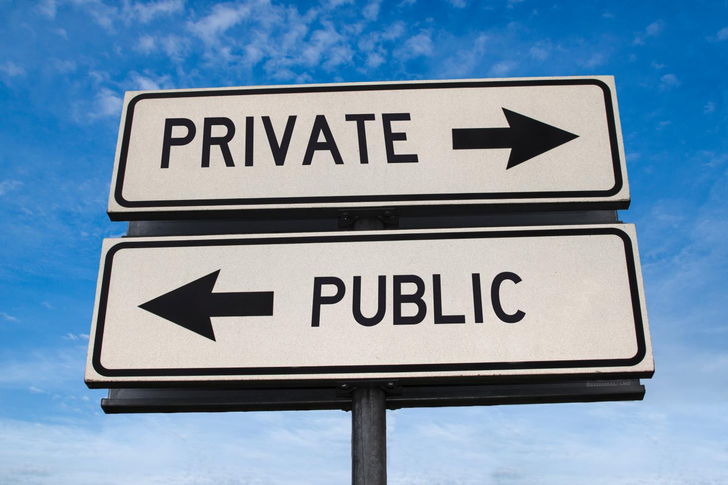 Image of a sign with words public and private and arrows pointing in opposite directions
