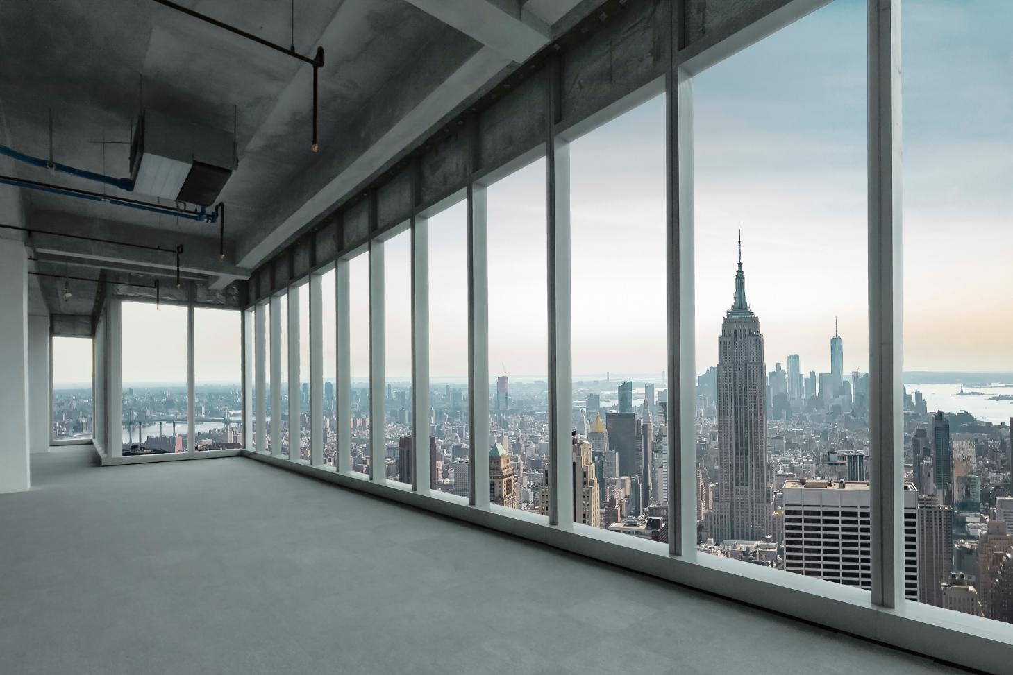 New York skyline seen through a vacant office window