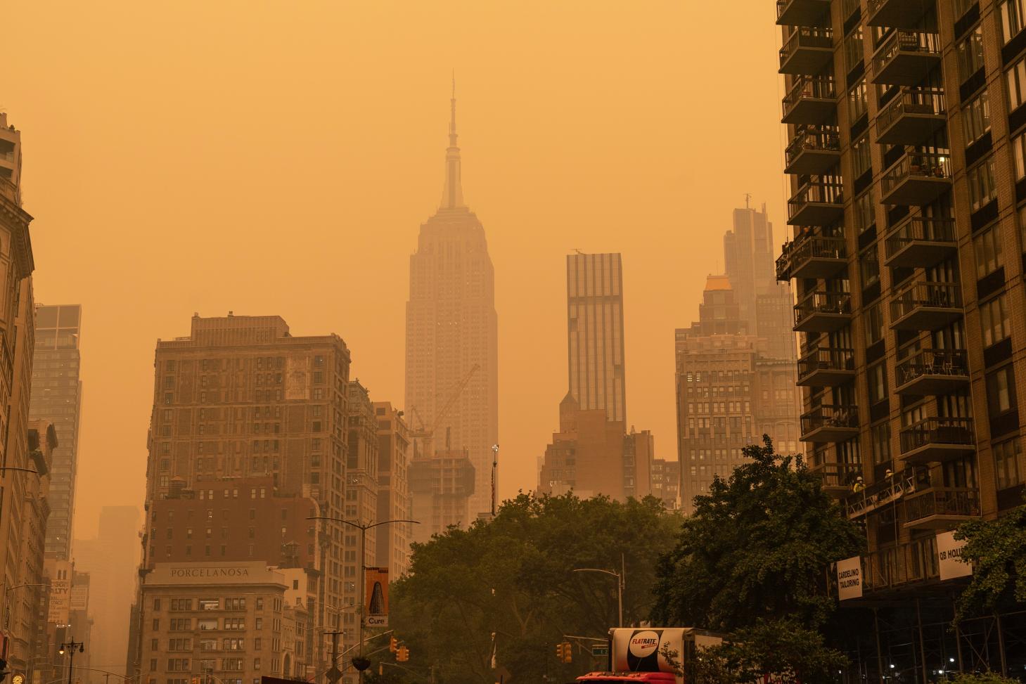 Smoke from wildfires blanketed cities many places across the Northeast and Midwest this week, leading to air quality at unhealthy levels in many regions and turning skies orange.